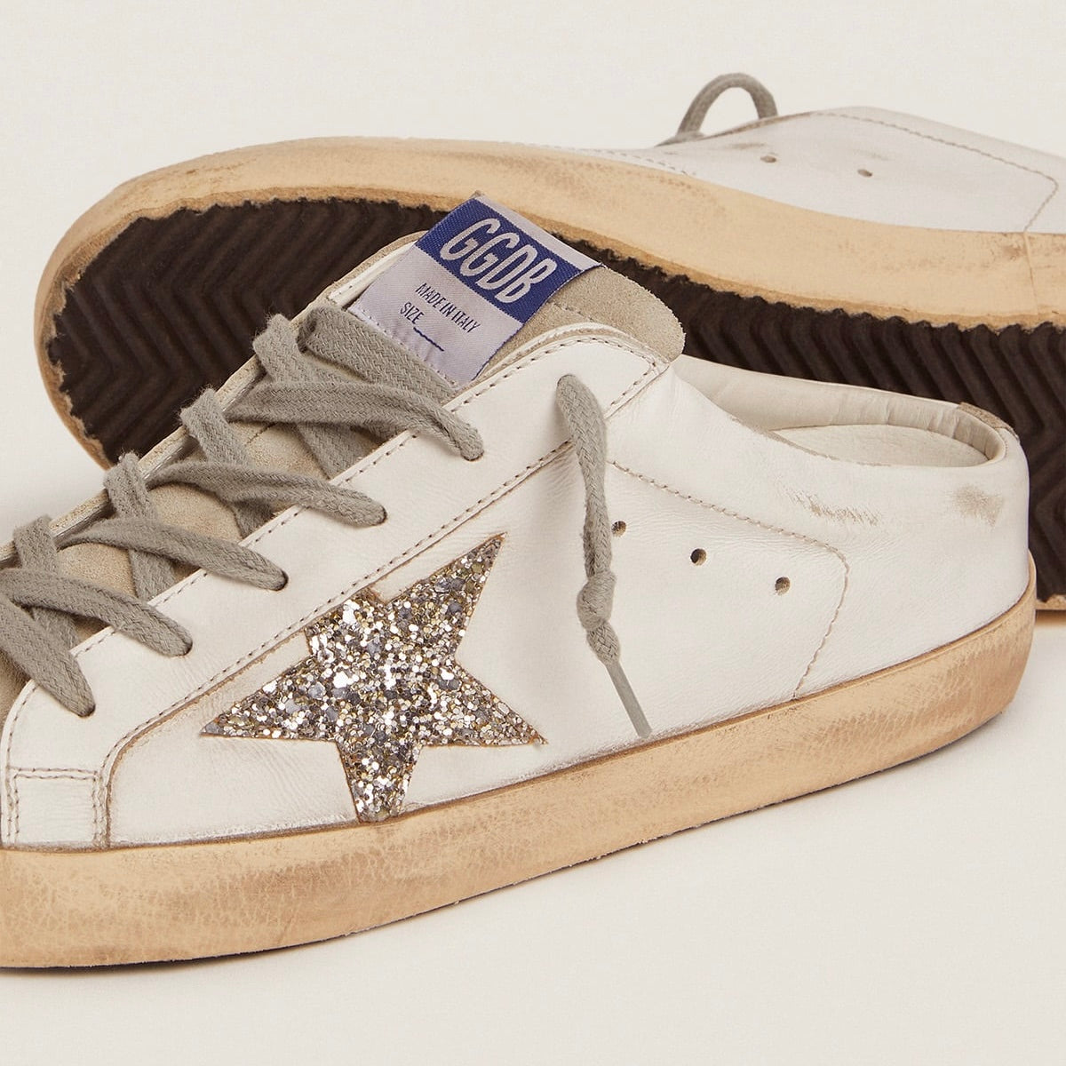 Golden Goose Super-Star Sabot with a platinum glitter star and suede tongue(Women's)