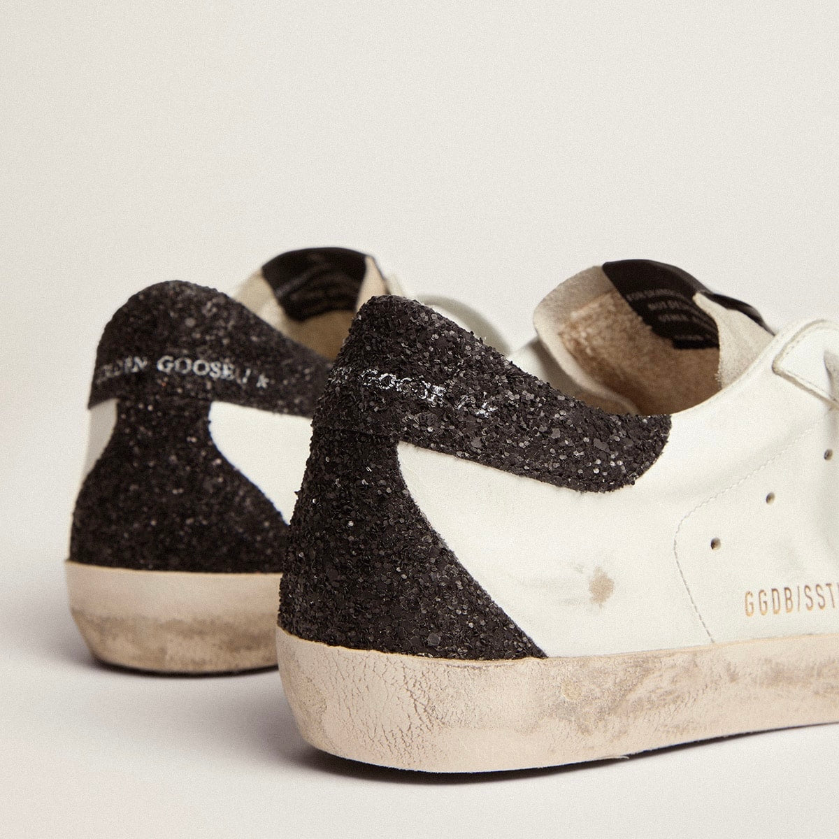 Golden Goose Super-Star in nappa leather with gold glitter star and black glitter heel tab(Women's)