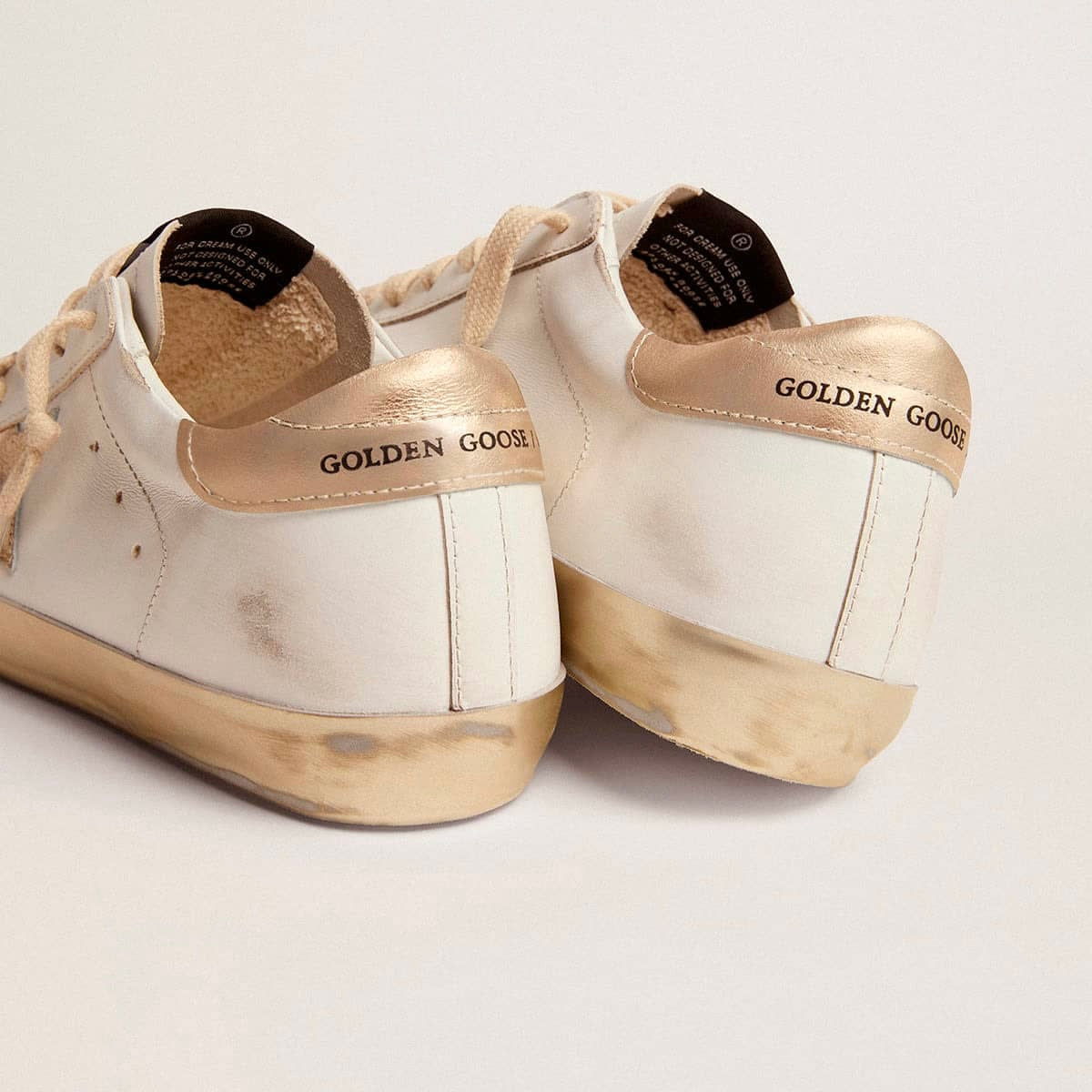 Golden Goose Super-Star with gold sparkle foxing and metal stud lettering(Women's)