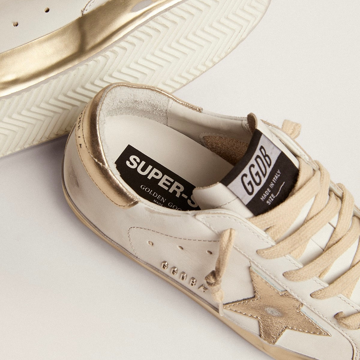 Golden Goose Super-Star with gold sparkle foxing and metal stud lettering(Women's)